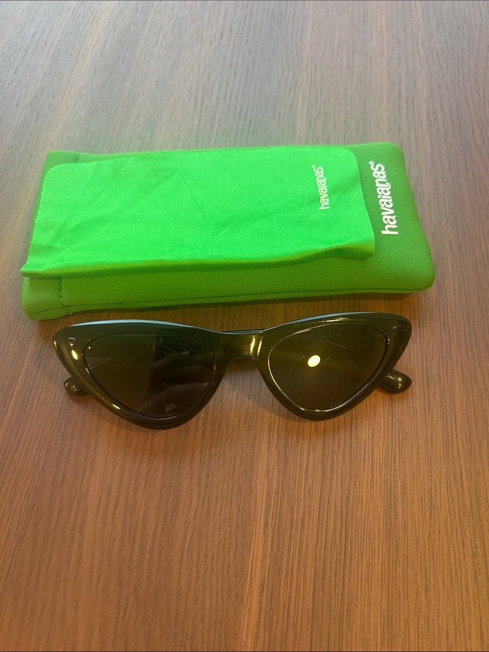 Havaianas Black Cat-Eye Sunglasses with Bright Green Soft Case